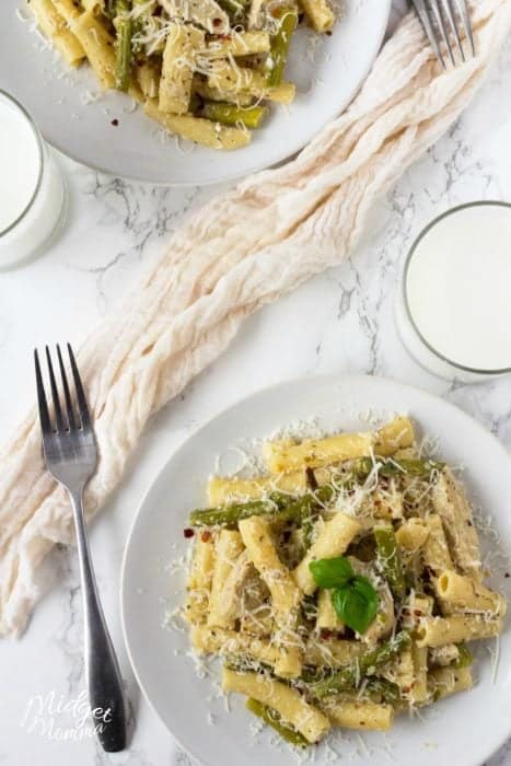 My family loves it when I make this Chicken Asparagus Alfredo Pasta. It is an easy pasta dish with ziti noodles, chicken and asparagus tossed in a creamy Alfredo Sauce!