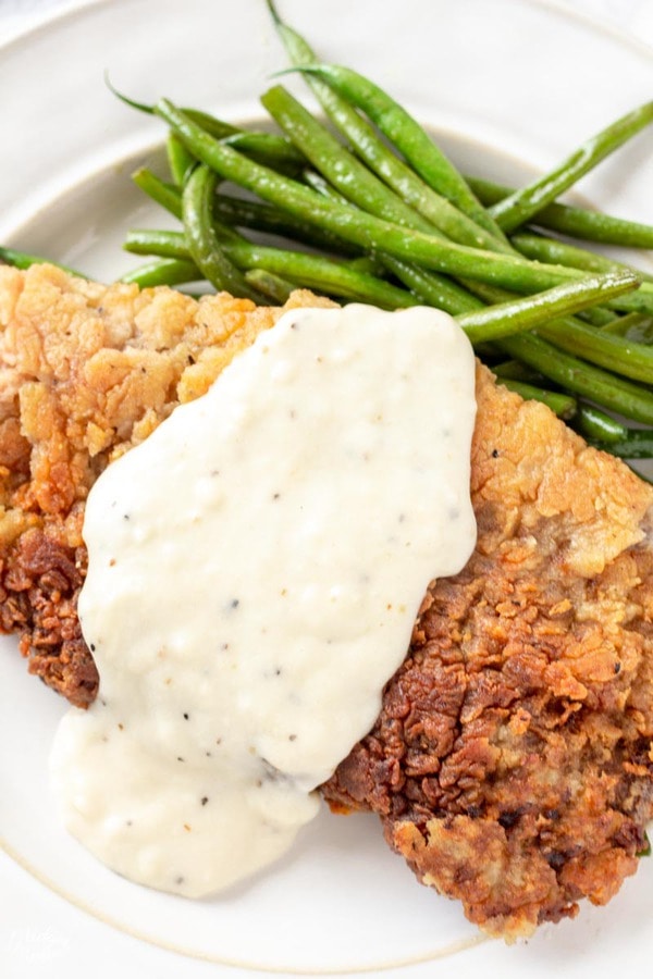 Chicken Fried Steak with white gravy and green beans