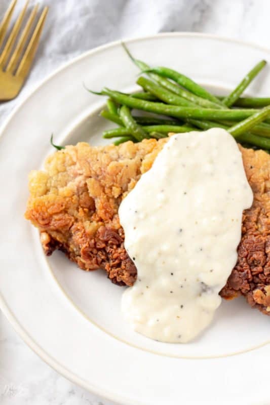 Homemade chicken fried steak with white gravy