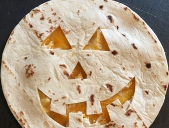 Jack O Lantern Quesadillas are super easy to make! Jack O Lantern Quesadillas take just a few minutes to make too! Kids will love Jack O Lantern Quesadillas