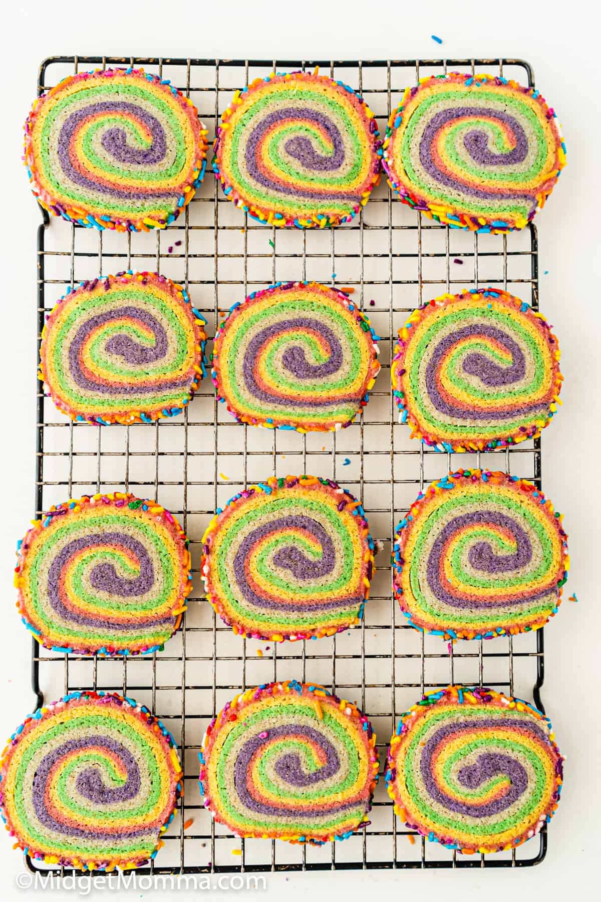 Rainbow Pinwheel Cookies Recipe on a cooling rack