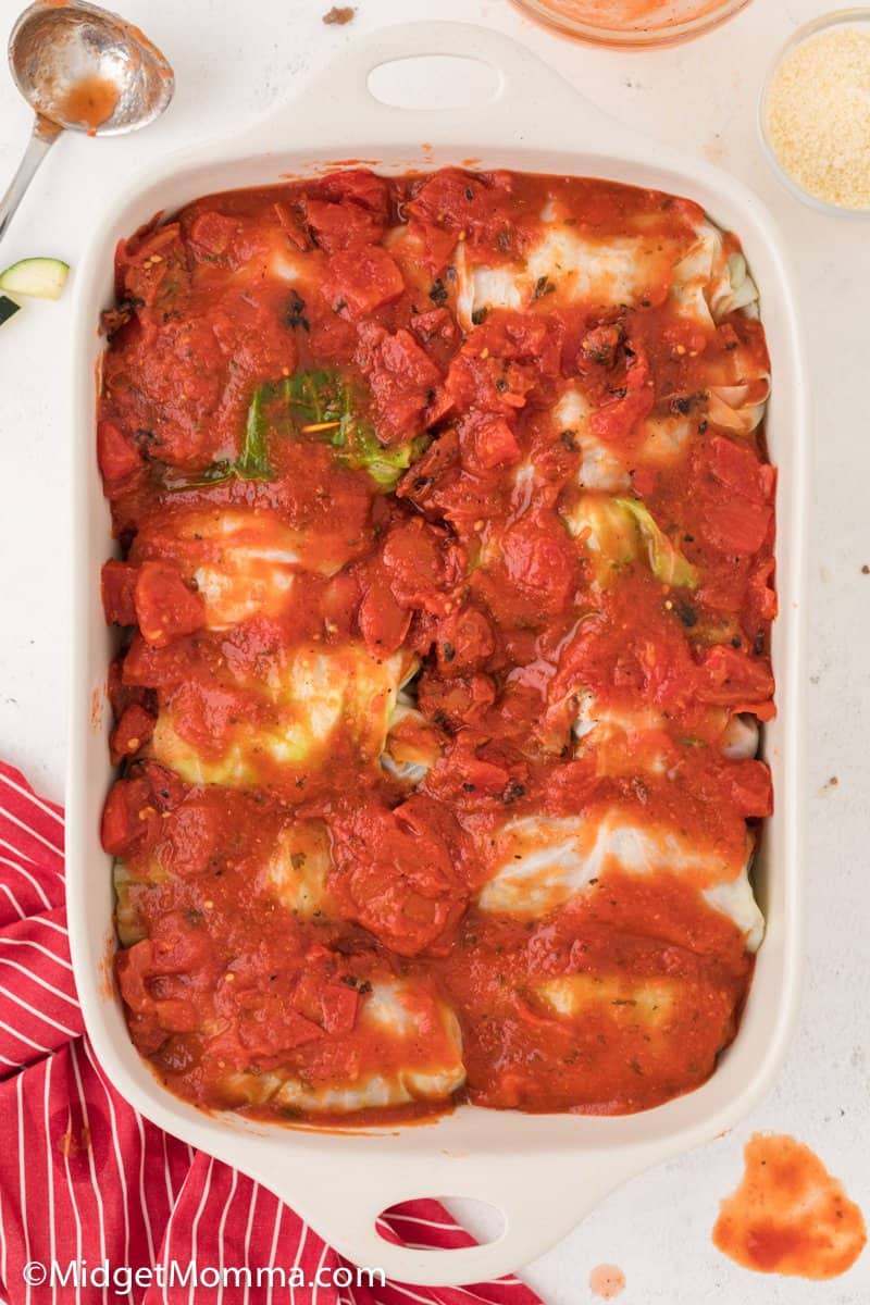 Stuffed Cabbage Rolls in a baking dish with sauce