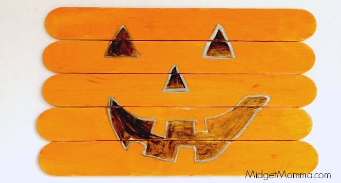 Popsicle Stick Halloween Puzzle, halloween hand and fooprint craft, halloween craft, kids halloween craft, halloween handprint, halloween footprint, foot print craft, kids foot prints, kids handprints craft 