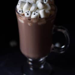 Marshmallow Ghosts in a glass of homemade hot chocolate