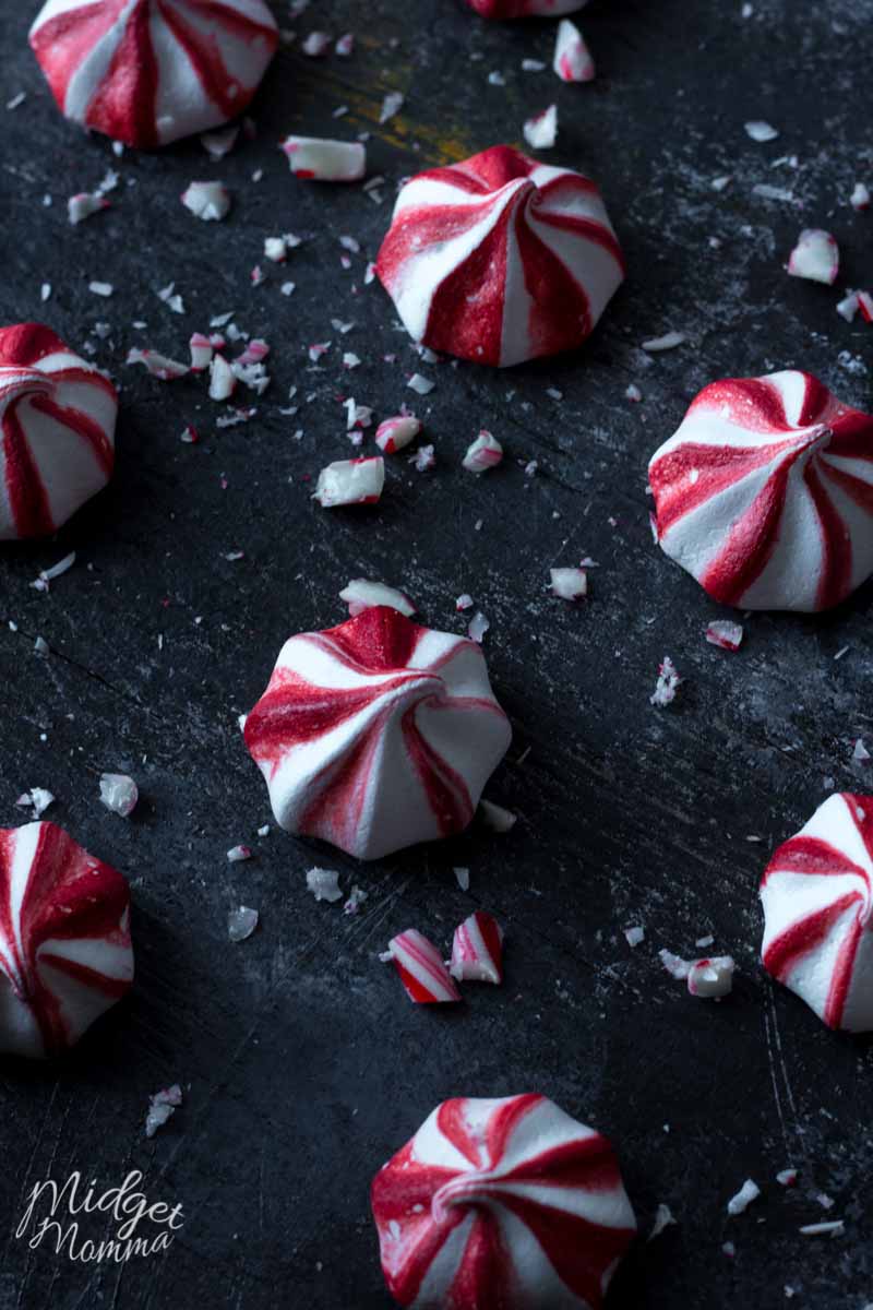 Peppermint Meringue cookies on a black background