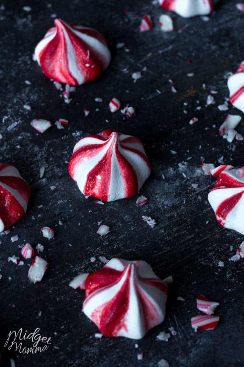 Close up photo of red and white peppermint meringue cookies