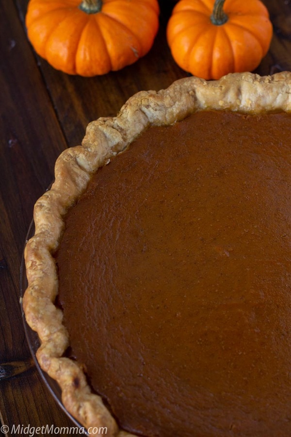 fresh baked maple pumpkin pie cooling on the counter