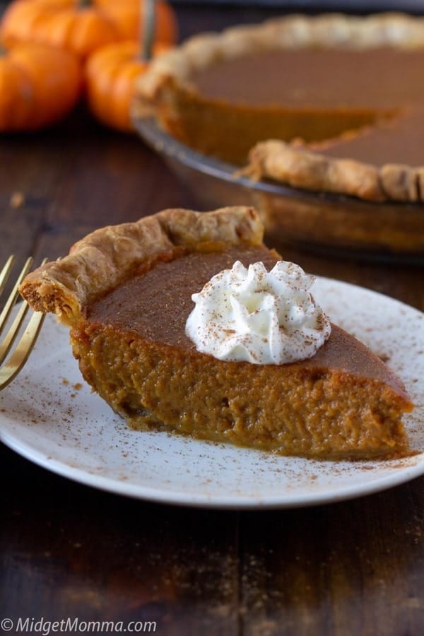 slice of pumpkin pie made with maple syrup on a plate