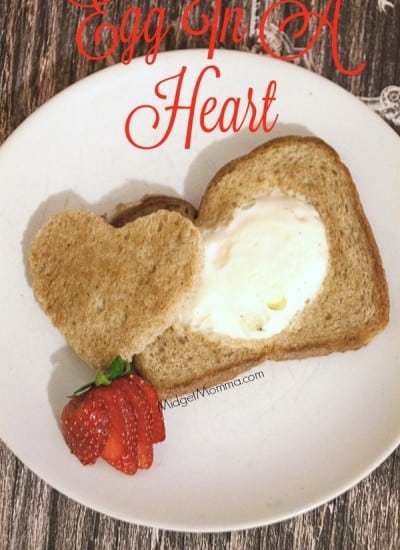 Egg In A Heart. A fun twist on your traditional egg in a hole, but so much more fun because it has a heart. A fun one for Valentine's Day or just because.