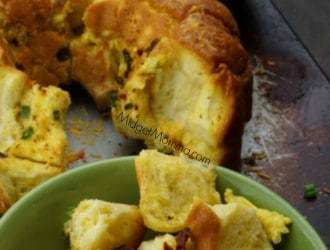 Tasty Bacon Egg Cheese Monkey Bread. Bacon Egg & Cheese Monkey Bread made with biscuits. Great breakfast for dinner recipe or for breakfast meals.