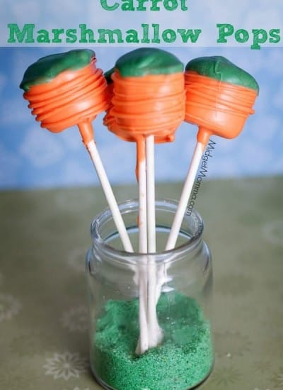 Carrot Marshmallow Pops. Super cute marshmallows turned in to carrots with dipping chocolate. Great tasty easter treat!