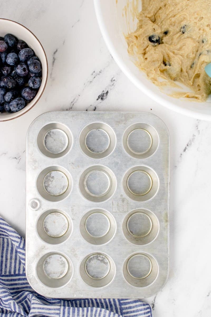 greased mini muffin tin