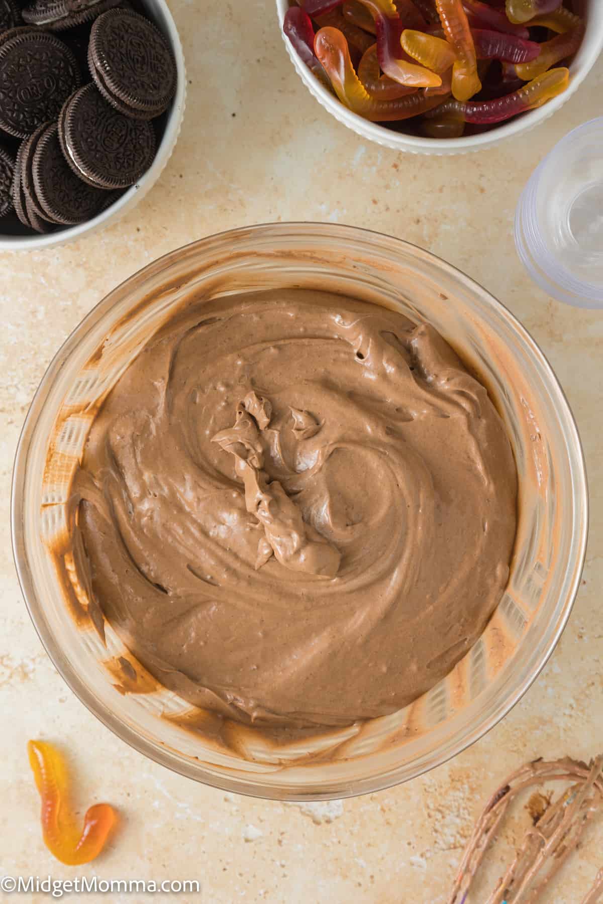 chocolate pudding and cool whip folded together in a bowl