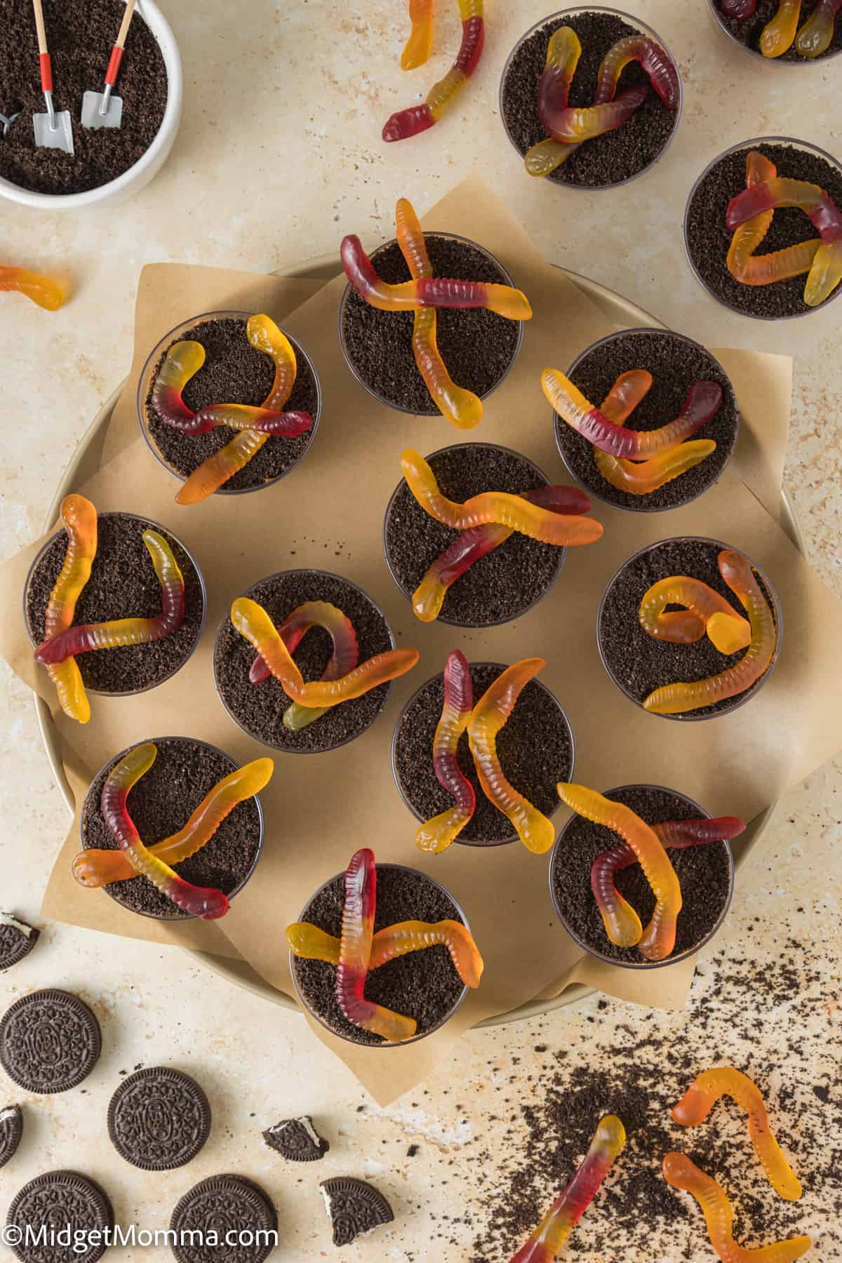 overhead photo of a platter with many Oreo Cookie Dirt Cups Pudding Parfaits 