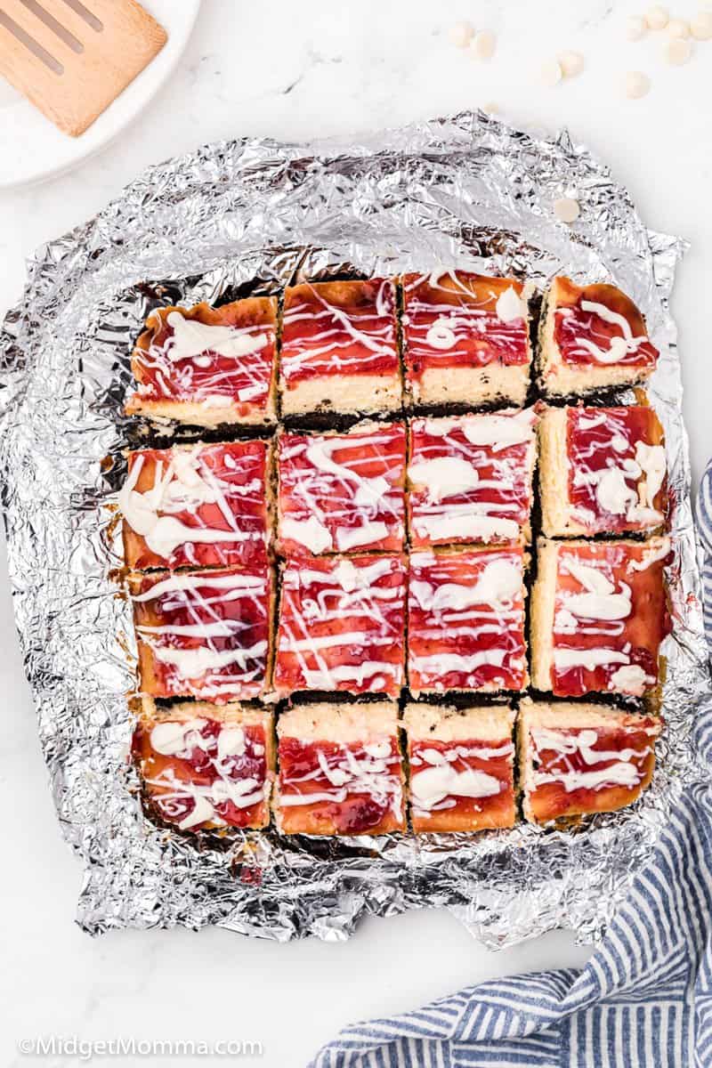 Strawberry White Chocolate Cheesecake Bars in a baking pan