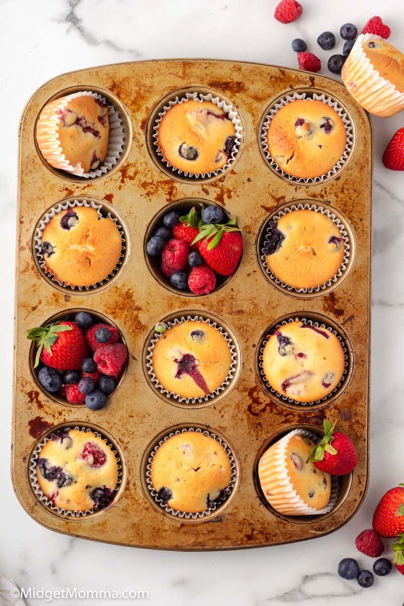 overheaad shot of Triple Berry Muffins in a muffin tin