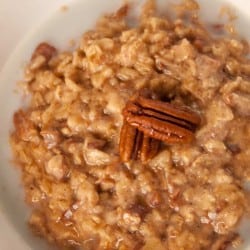 homemade oatmeal with pecans in a bowl