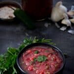 Restaurant Style Salsa made at home in a bowl with blue tortilla chips