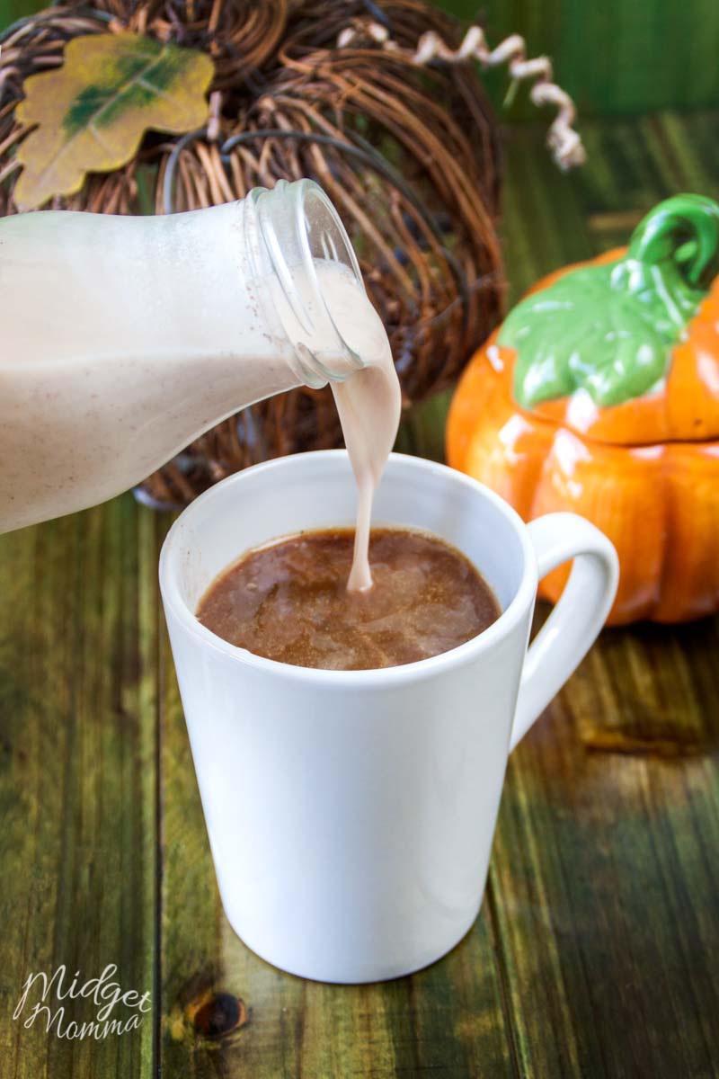 homemade pumpkin spice creamer being poured into a cup of coffee