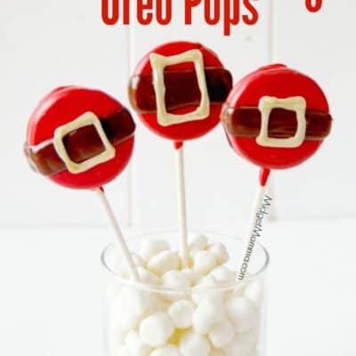 Christmas Oreo Pops decorated to look like Santa's belly. Oreo cookies dipped in chocolate decorated for Christmas to make these super cute Christmas Oreo Pops.