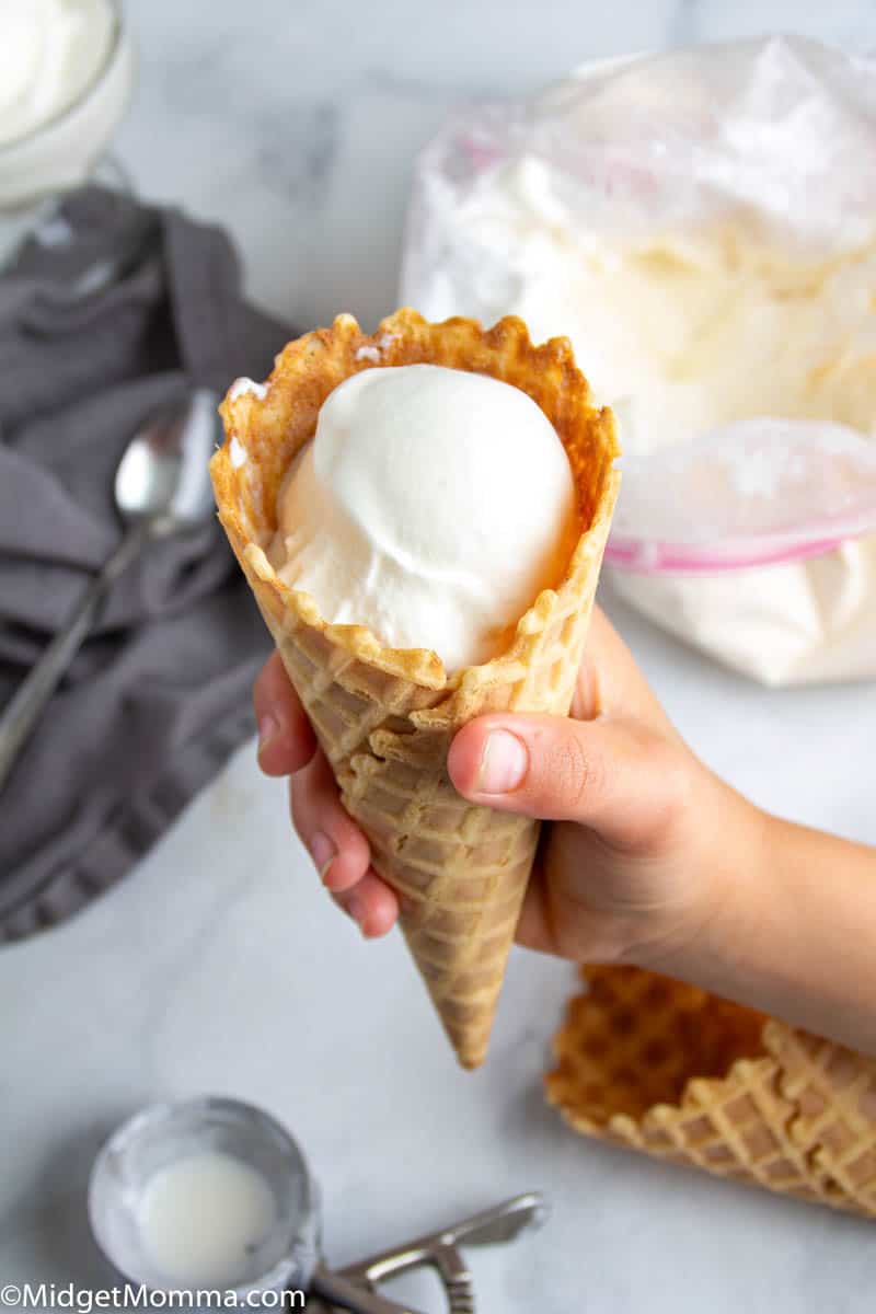 homemade ice cream in a bag being served in a cone