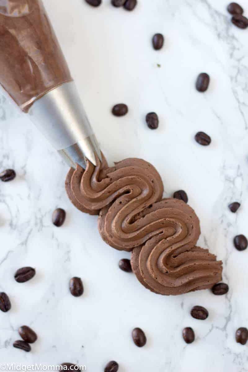 MOcha buttercream frosting in a piping bag