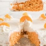 front photo of Orange Soda Cake with a slice cut out