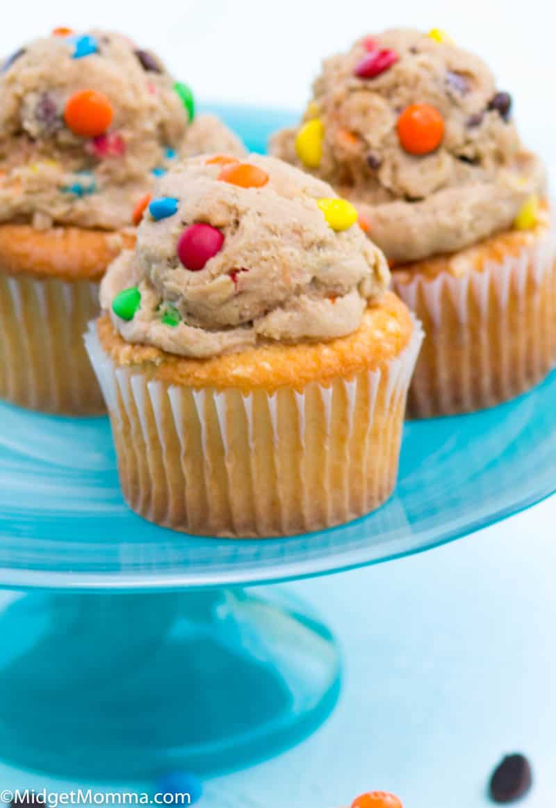 monster cookie frosting cupcakes on a platter