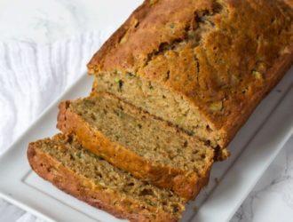 If you are looking for an amazing Zucchini Bread recipe then you do not want to miss this homemade zucchini bread. It is a moist zucchini bread made with fresh zucchini! The perfect recipe to use up any extra zucchini that you have! #Zucchini #bread #MoistBread #ZucchiniBread