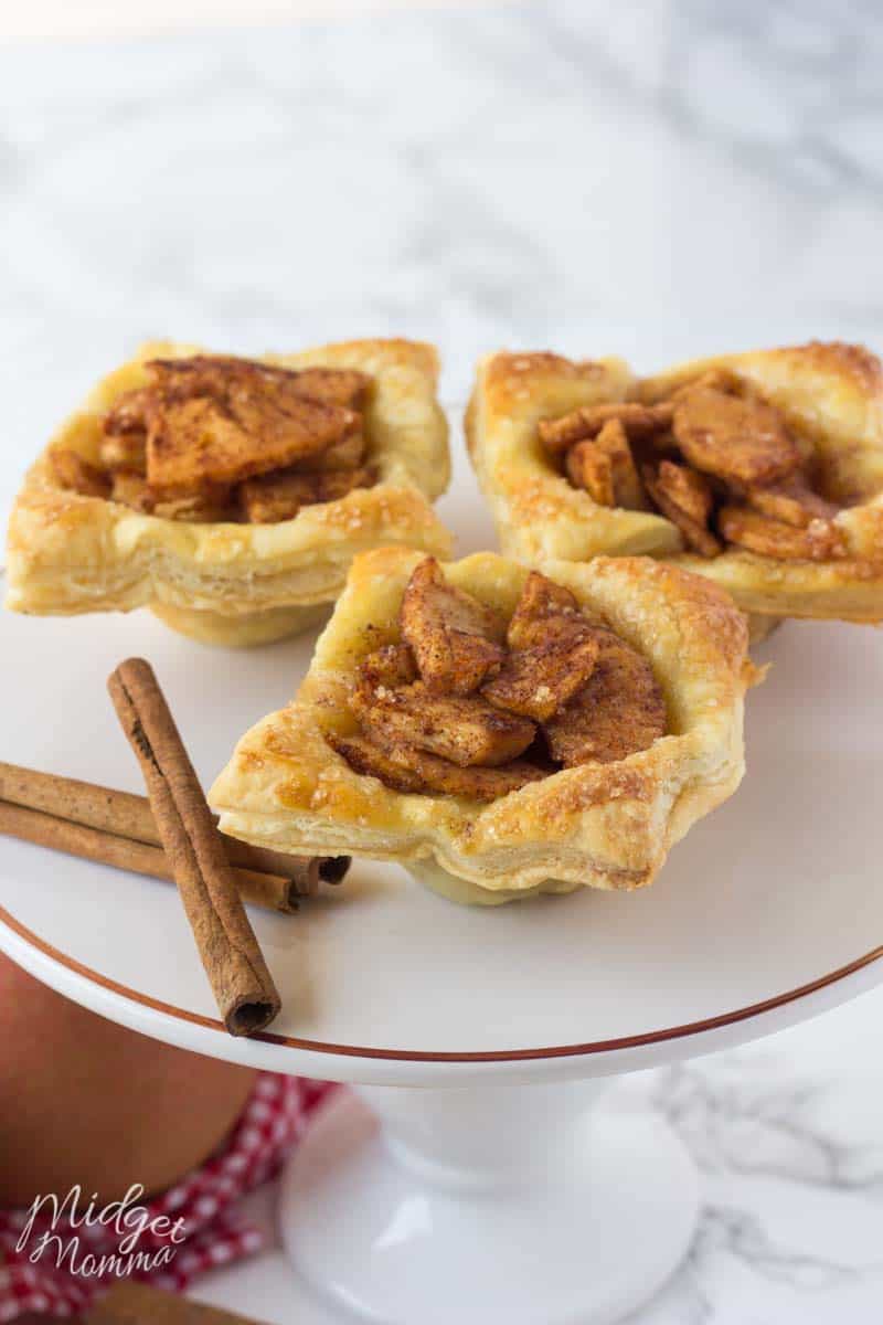 3 puff pastry apple pie on a dessert plate