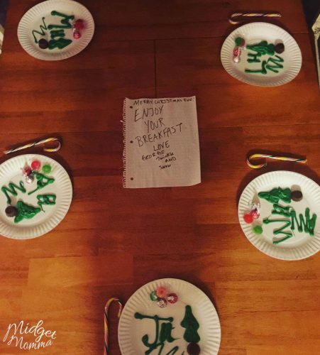 Elf on the Shelf Brings Breakfast idea. Hand drawn chocolates and candycanes on white plates with a note from the elf on the shelf. Easy Elf on the shelf Ideas