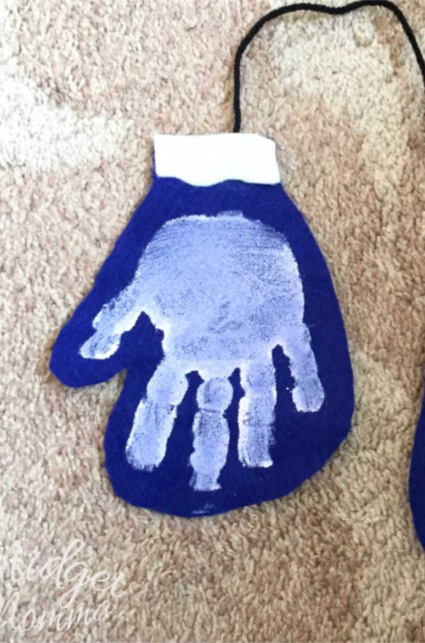 Handprint mittens craft. Turn your kids handprints into cute little mittens!