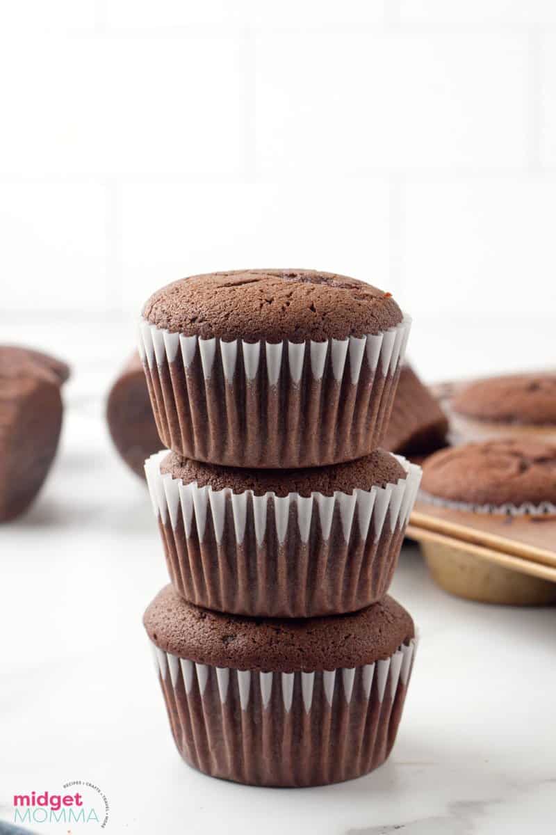 stack of unfrosted chocolate cupcakes