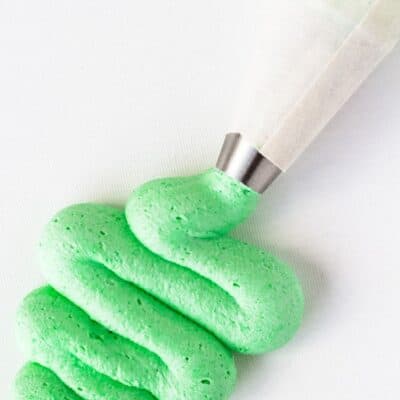mint buttercream in a pipping bag