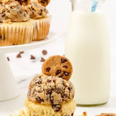 Chocolate Chip Cupcakes with the wrapper pulled off and a glass of milk