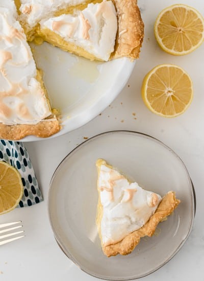 overhead photo of a slice of Lemon Meringue Pie on a plate