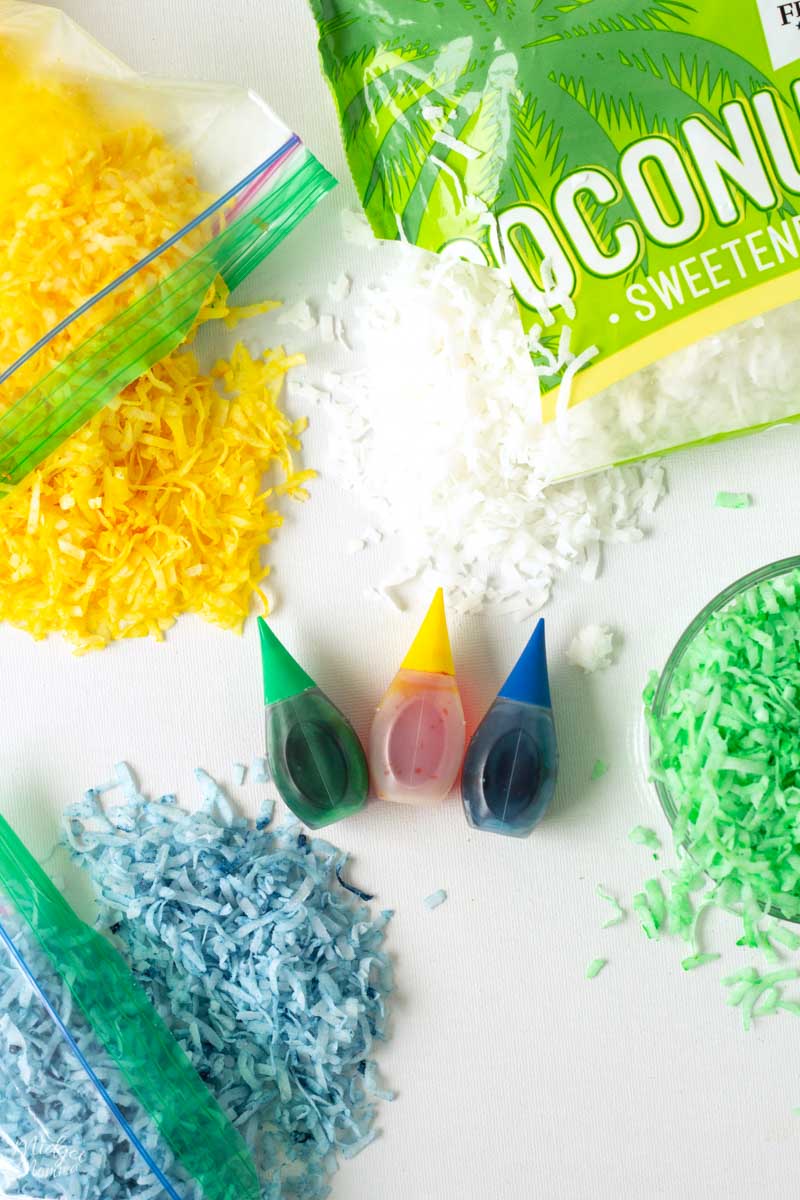How to Color Coconut - Ingredients and colored coconut on the counter.