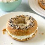 Keto bagel with cream cheese on a plate