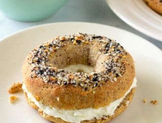 Keto bagel with cream cheese on a plate