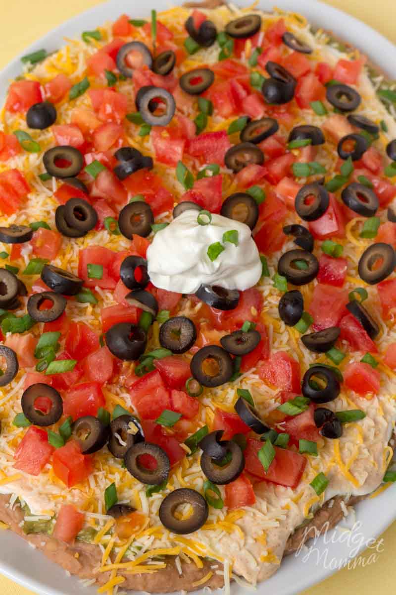 The BEST 7 Layer Dip Recipe • MidgetMomma