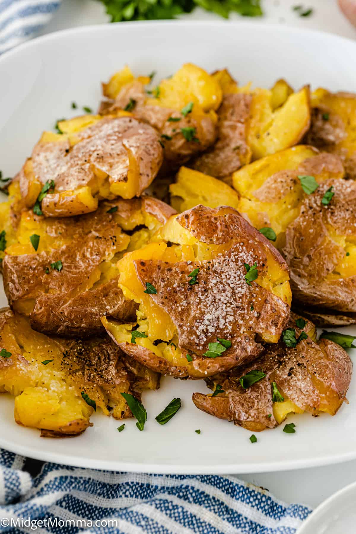 close up photo of Crispy Smashed Potatoes on a plate