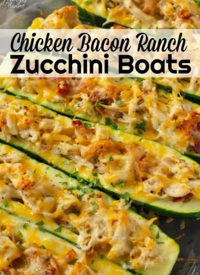 Chicken Bacon Ranch Zucchini boats are an amazing stuffed zucchini boat recipe. Easy to make baked zucchini recipe that has amazing flavors of chicken, bacon and ranch and then topped with cheese! #chicken #Bacon #Ranch #Cheese #zucchini #keto #lowCarb #BakedZucchini #Easy Recipe #ZucchiniBoats