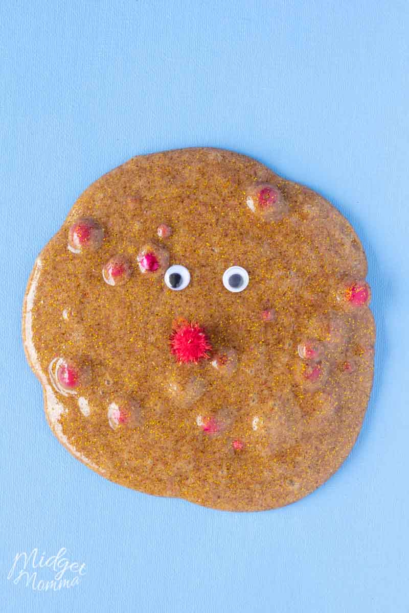 This Cinnamon Scented Reindeer Slime is so much fun to make! A clear glue slime recipe that uses cinnamon to color the slime and make it smell amazing. Add in some fun red beads and red puffs and googley eyes to make this fun christmas slime look like rudolf the red nose reindeer!