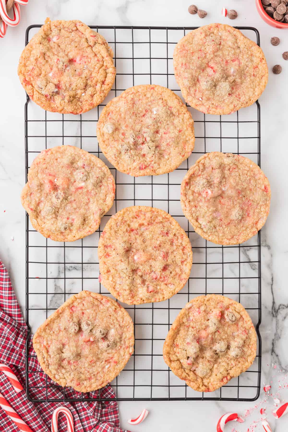 Peppermint chocolate chip cookies on a cooling rack.