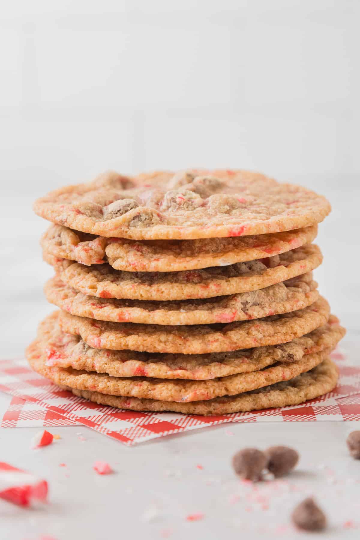 A stack of peppermint chocolate chip cookies on a table.