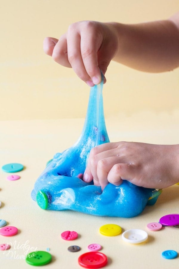 Kid playing with Easy glitter slime recipe