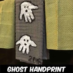 These handprint ghost towels are the perfect Halloween Decoration for your kitchen. Using handtowels, paint and your kids hands you can make this adorable handprint Halloween craft with the kids that will be a keepsake forever.