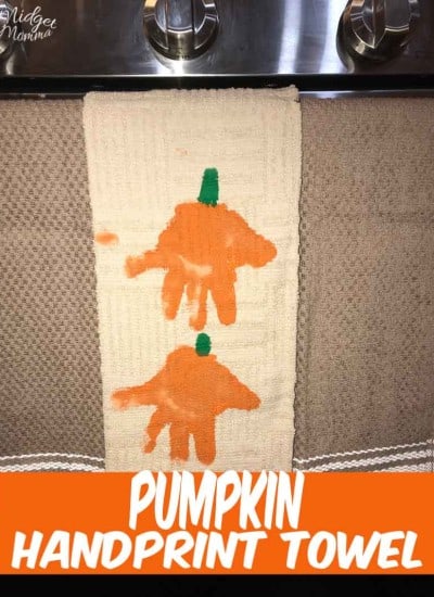 Turn your kids handprints in to adorable pumpkins with this Pumpkin Handprint Towels craft!