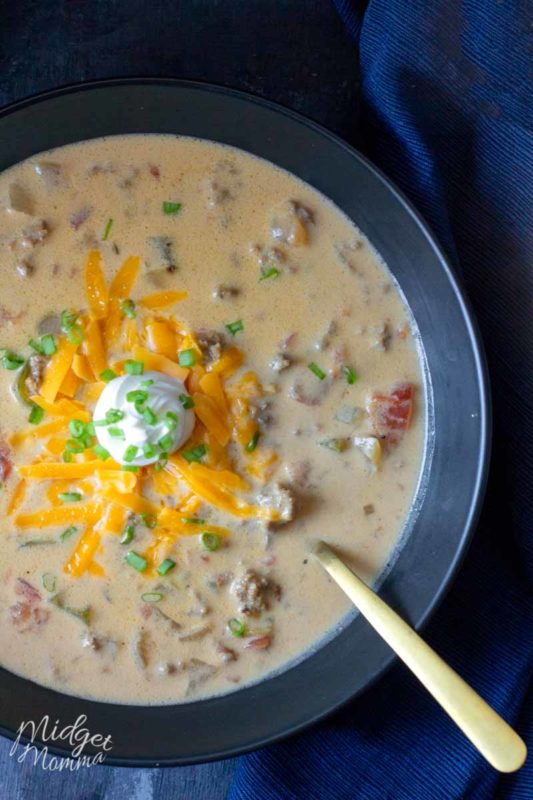keto Cheeseburger soup in a bowl topped with cheese and sour cream