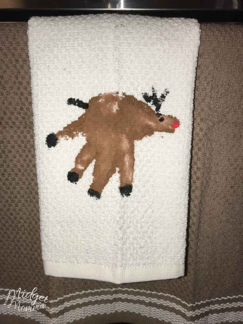 Reindeer Handprint towel hanging on the stove